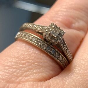 White gold engagement ring and wedding band set.